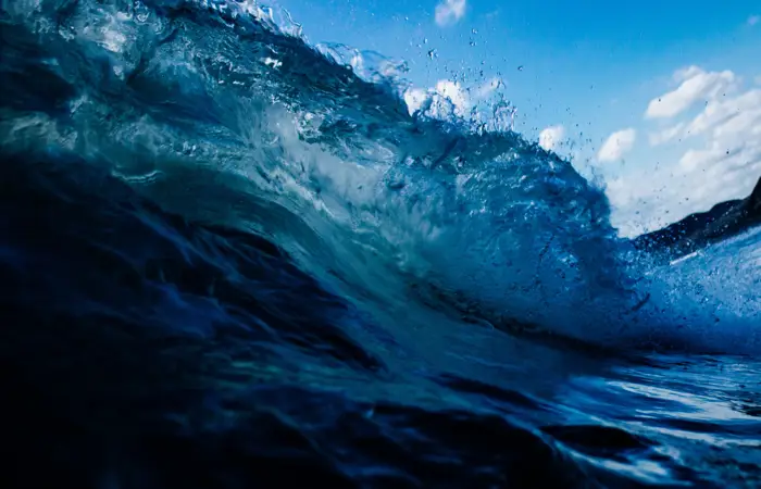 Blue crashing ocean wave